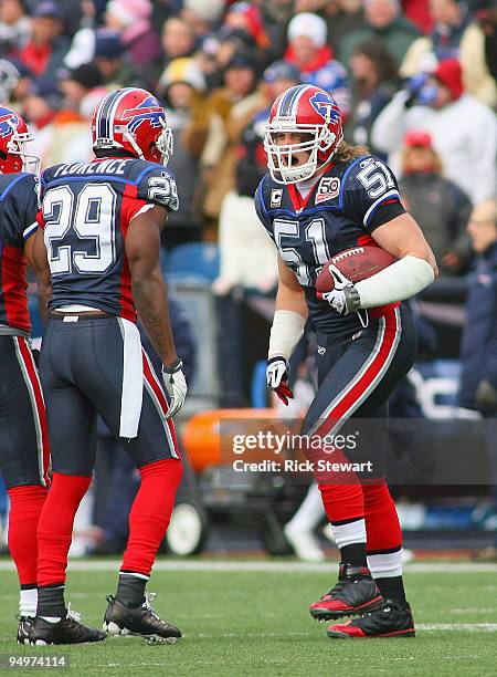 Paul Posluszny and Drayton Florence of the Buffalo Bills celebrate Posluszny's interception against the New England Patriots at Ralph Wilson Stadium...