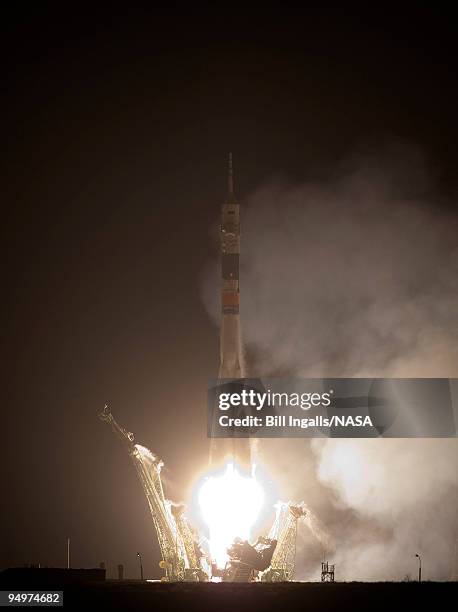 In this photo provided by NASA, The Soyuz TMA-17 rocket launches from the Baikonur Cosmodrome December 21, 2009 in Baikonur, Kazakhstan. The...