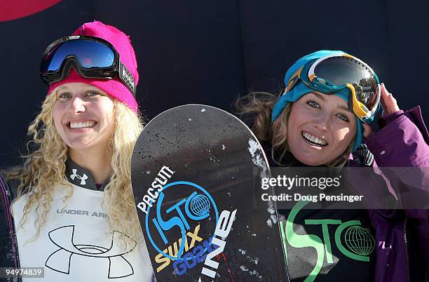 Lindsey Jacobellis and Faye Gulini of the USA take the podium after winning the Women's FIS Snowboardcross Team World Cup on December 20, 2009 in...