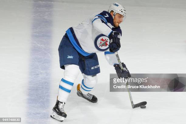 Ben Chiarot of the Winnipeg Jets passes the puck against the Minnesota Wild in Game Three of the Western Conference First Round during the 2018 NHL...