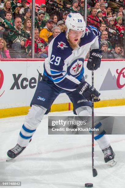 Patrik Laine of the Winnipeg Jets handles the puck against the Minnesota Wild in Game Three of the Western Conference First Round during the 2018 NHL...