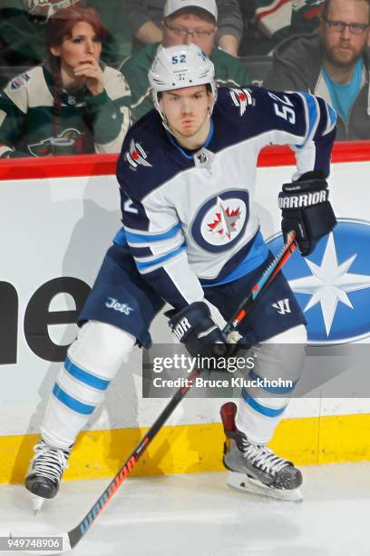 Jack Roslovic of the Winnipeg Jets skates against the Minnesota Wild in Game Three of the Western Conference First Round during the 2018 NHL Stanley...