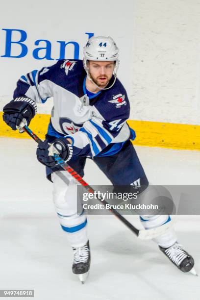 Josh Morrissey of the Winnipeg Jets passes the puck against the Minnesota Wild in Game Three of the Western Conference First Round during the 2018...