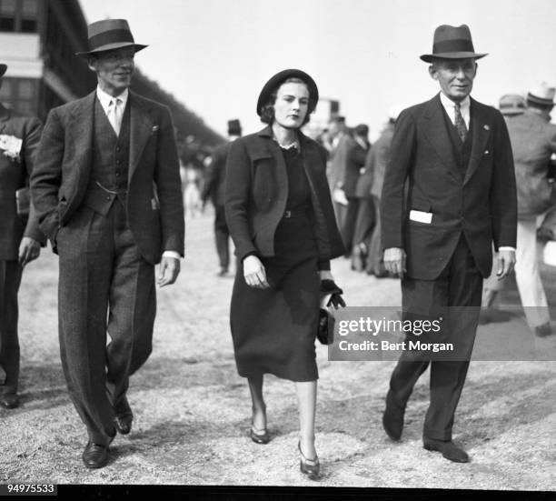 Fred Astaire, famous dancer, singer and actor, with his wife Phyllis and Mr Henry W. Bull, attending the races at Aqueduct Raceway in New York,...
