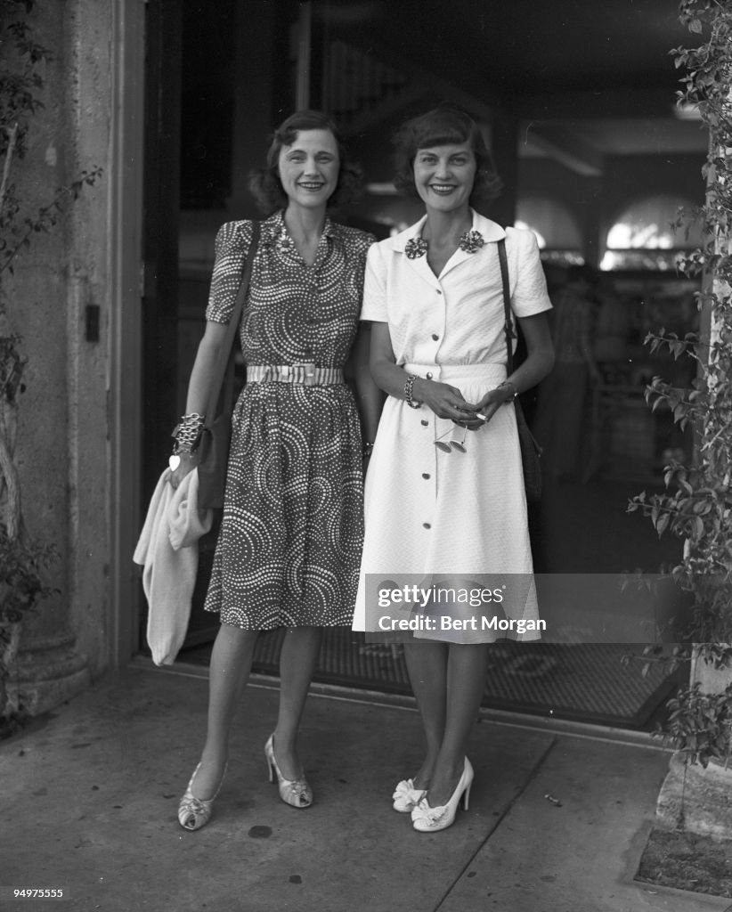 Mrs T. Markoe Robertson (nee Cordelia Drexel Biddle) stands with her daughter-in-law Mrs Angier Biddle Duke (nee Margaret Screven White), Palm Beach, Florida c1953