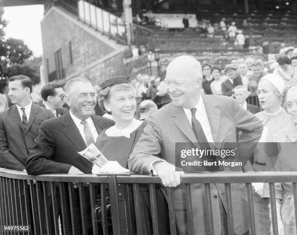 Robert J Kleberg Jr, owner of the King Ranch in Texas with Mrs and Mr Dwight Eisenhower at Belmont Park Racterack, Elmont, NY, June 3, 1961