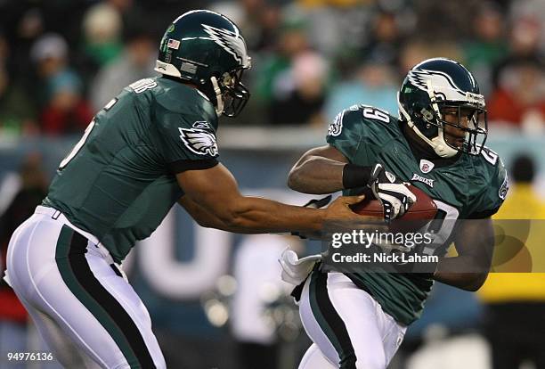 Donovan McNabb of the Philadelphia Eagles hands the ball off to LeSean McCoy against the San Francisco 49ers at Lincoln Financial Field on December...