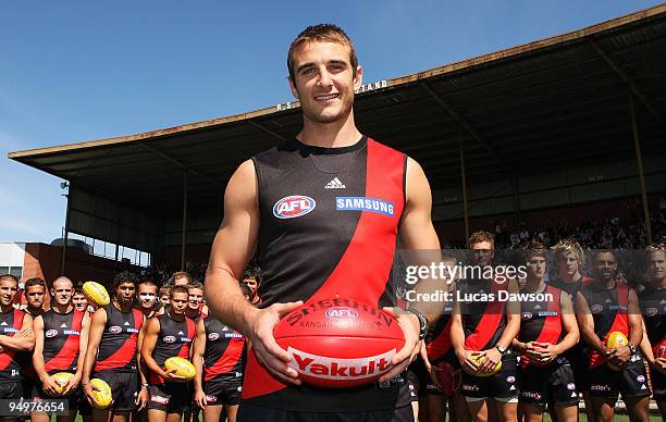 Jobe Watson poses with team-mates after being named Essendon captain for the 2010 AFL season during an Essendon Bombers AFL training session at Windy...