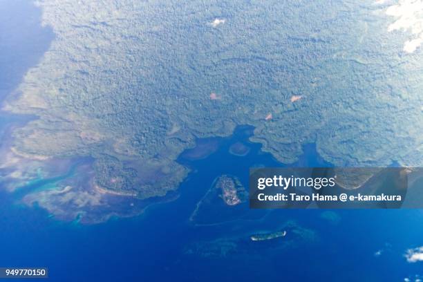 manus island in admiralty islands in manus province in papua new guinea daytime aerial view from airplane - papua new guinea foto e immagini stock