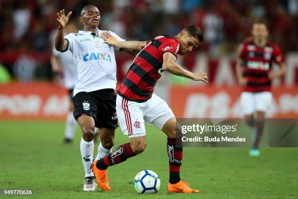 Gustavo Cuellar of Flamengo struggles for the ball with Juninho of America MG during a match between Flamengo and America MG as part of Brasileirao...