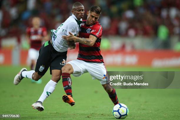 Gustavo Cuellar of Flamengo struggles for the ball with Juninho of America MG during a match between Flamengo and America MG as part of Brasileirao...