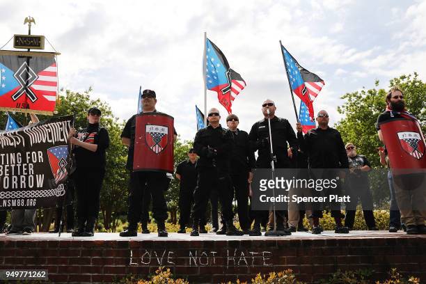 Members and supporters of the National Socialist Movement, one of the largest neo-Nazi groups in the US, hold a rally on April 21, 2018 in Newnan,...