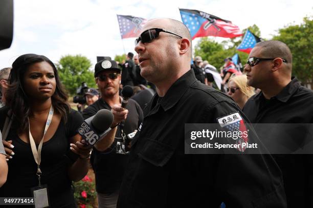 Jeff Schoep, the leader of the National Socialist Movement , speaks to the media at a rally on April 21, 2018 in Newnan, Georgia. Community members...