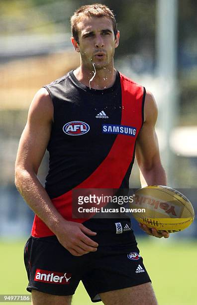 Jobe Watson of the Bombers spits during an Essendon Bombers AFL training session at Windy Hill on December 21, 2009 in Melbourne, Australia.