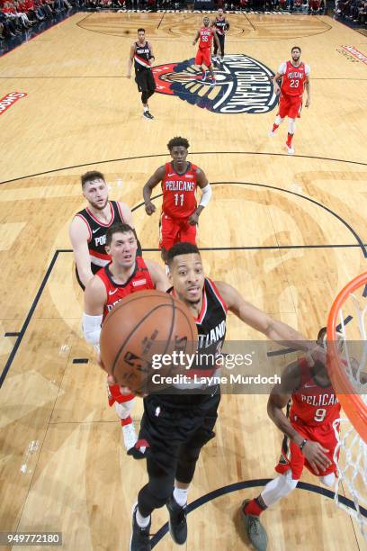 McCollum of the Portland Trail Blazers goes to the basket against the New Orleans Pelicans in Game Four of Round One of the 2018 NBA Playoffs on...