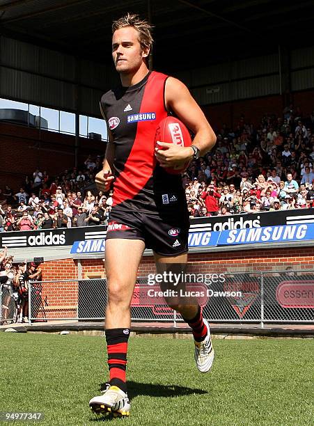 Andrew Welsh runs on to the ground after being named Essendon Vice captain for the 2010 AFL season during an Essendon Bombers AFL training session at...