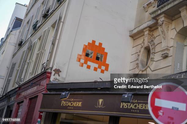 Street art by artist Invader, on April 21, 2018 in Paris, France.