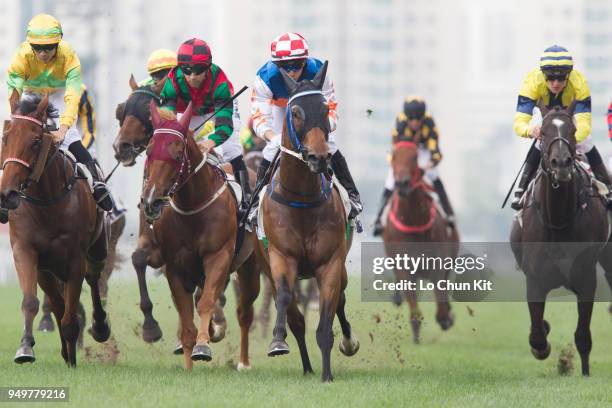 Jockey Victor Wong Chun riding Nice Fandango wins Race 1 Jockey Club Scholarships 20th Anniversary Handicap at Sha Tin racecourse on April 21 , 2018...