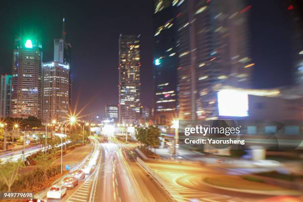 car traffic at night. motion blurred background.shanghai city,china - thruway stockfoto's en -beelden