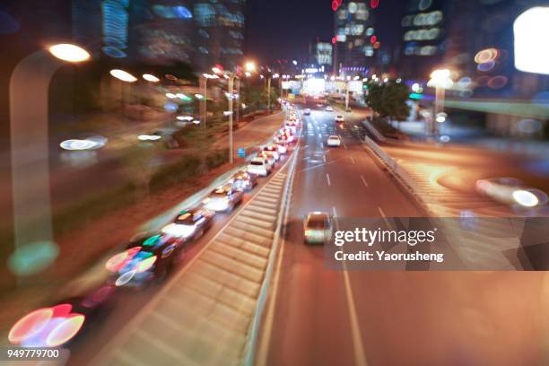 car traffic at night. motion blurred background.shanghai city,china - thruway stock-fotos und bilder