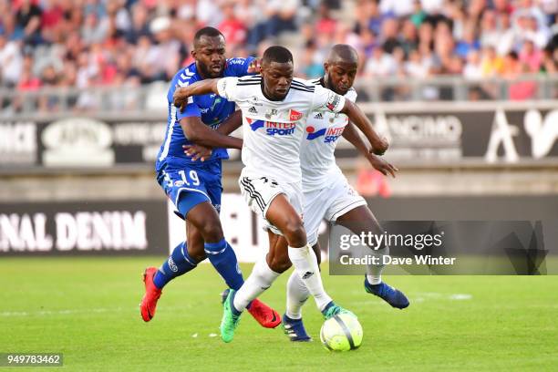 Stephane Bahoken of Strasbourg, Bakaye Dibassy of Amiens and Prince Desir Gouano of Amiens during the Ligue 1 match between Amiens SC and Strasbourg...