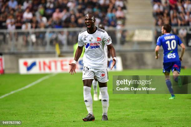 Moussa Konate of Amiens reacts during the Ligue 1 match between Amiens SC and Strasbourg at Stade de la Licorne on April 21, 2018 in Amiens, .