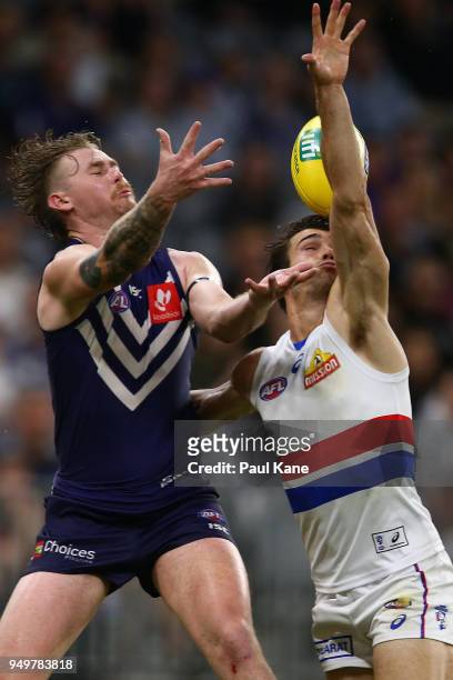 Cam McCarthy of the Dockers and Easton Wood of the Bulldogs contest for a mark during the round five AFL match between the Fremantle Dockers and the...