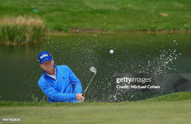 Tom Watson hits his second shot on the fifth hole from a bunker during the third round of the PGA TOUR Champions Bass Pro Shops Legends of Golf at...