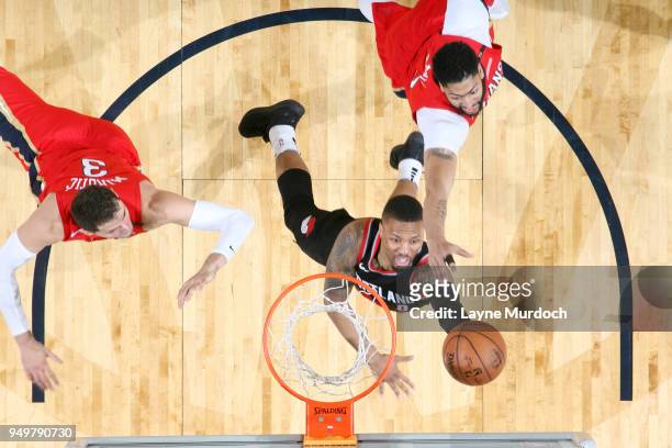 Damian Lillard of the Portland Trail Blazers goes to the basket against the New Orleans Pelicans in Game Four of Round One of the 2018 NBA Playoffs...