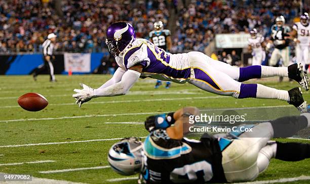 Madieu Williams of the Minnesota Vikings nearly intercepts a pass intended for Steve Smith of the Carolina Panthers at Bank of America Stadium on...