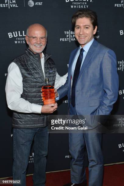Tom Bulleit toasted Michael Zegen for his contributions to the film community, at the Bulleit Frontier Whiskey official afterparty for the premiere...
