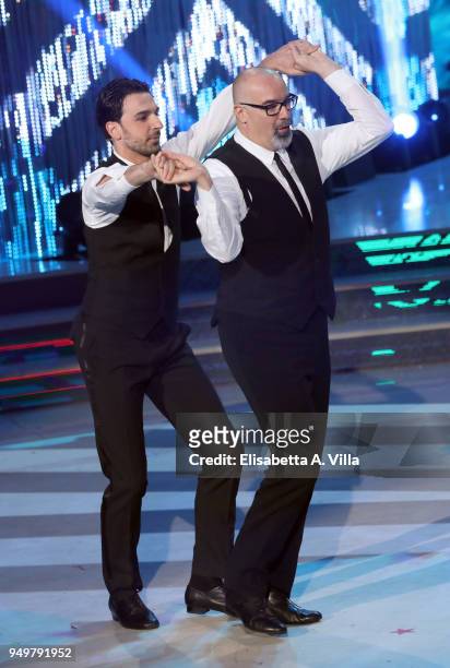 Italian beauty tutor Giovanni Ciacci and his dance partner Raimondo Todaro perform at the Italian TV show 'Ballando Con Le Stelle' at RAI Auditorium...