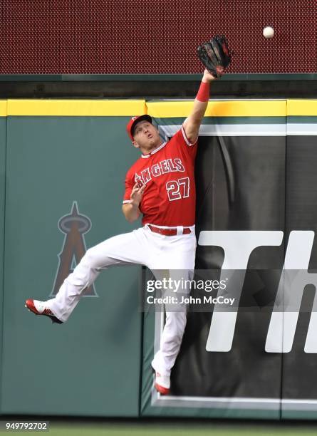 Center fielder Mike Trout of the Los Angeles Angels of Anaheim can not get to the home run ball hit by Brandon Belt of the San Francisco Giants in...
