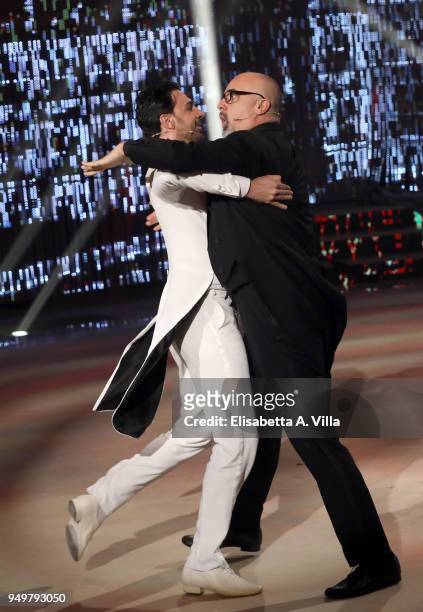 Italian beauty tutor Giovanni Ciacci and his dance partner Raimondo Todaro perform at the Italian TV show 'Ballando Con Le Stelle' at RAI Auditorium...