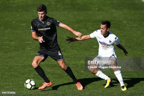 Mario Ilich of Team Wellington is challenged by Cameron Howieson of Auckland City FC during leg one of the OFC Champions League 2018 Semi-finals...