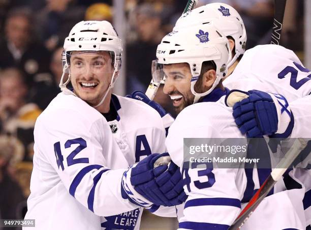 James van Riemsdyk of the Toronto Maple Leafs, celebrates with Nazem Kadri and Tyler Bozak after scoring a goal against the Boston Bruins during the...