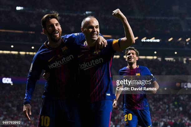 Andres Iniesta of FC Barcelona celebrates with his team mate Lionel Messi after scoring his team's fourth goal during the Spanish Copa del Rey Final...