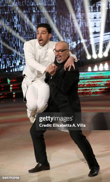 Italian beauty tutor Giovanni Ciacci and his dance partner Raimondo Todaro perform at the Italian TV show 'Ballando Con Le Stelle' at RAI Auditorium...