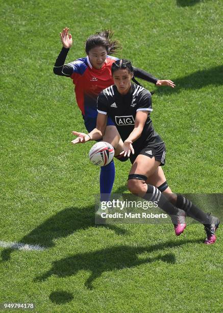 Sarah Goss of New Zealand passes the ball on day two of the HSBC Women's Rugby Sevens Kitakyushu Cup quarter-final match between New Zealand and...