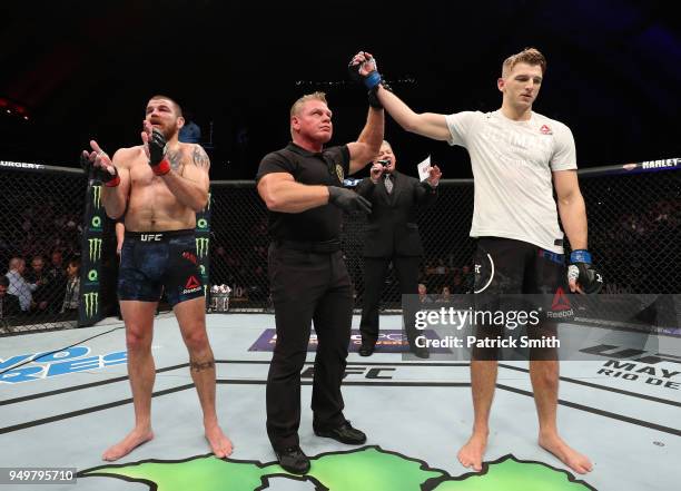 Dan Hooker of New Zealand celebrates after his knockout victory over Jim Miller in their lightweight fight during the UFC Fight Night event at the...