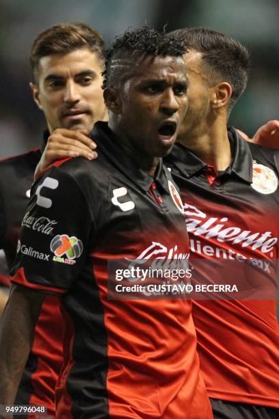 Tijuana's Ecuadorean player Miller Bolanos celebrates his goal with teammates against Leon during their 2018 Mexican Clausura tournament football...