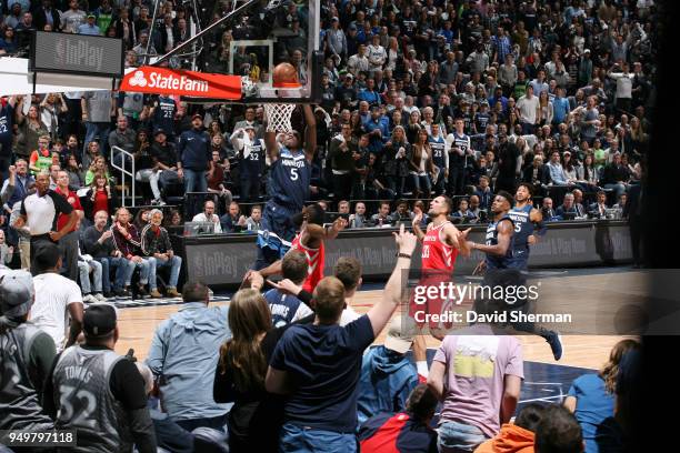 Gorgui Dieng of the Minnesota Timberwolves dunks the ball against the Houston Rockets in Game Three of Round One of the 2018 NBA Playoffs on April...