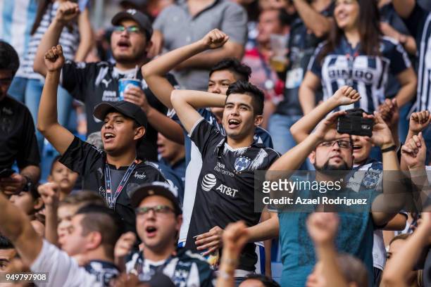 Fans of Monterrey cheer their team during the 16th round match between Monterrey and Lobos BUAP as part of the Torneo Clausura 2018 Liga MX at BBVA...