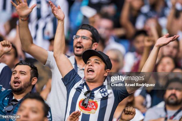 Fans of Monterrey cheer their team during the 16th round match between Monterrey and Lobos BUAP as part of the Torneo Clausura 2018 Liga MX at BBVA...