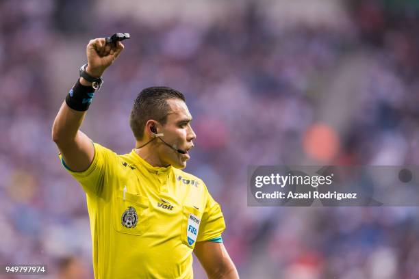 Referee Marco Antonio Ortiz in action during the 16th round match between Monterrey and Lobos BUAP as part of the Torneo Clausura 2018 Liga MX at...