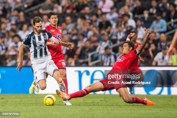 Jose Maria Basanta of Monterrey fights for the ball with Francisco Rodriguez of Lobos during the 16th round match between Monterrey and Lobos BUAP as...