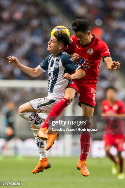 Lucas Albertengo of Monterrey heads the ball with Eduardo Tercero of Lobos during the 16th round match between Monterrey and Lobos BUAP as part of...