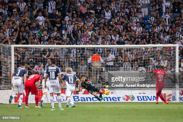 Hugo Gonzalez, goalkeeper of Monterrey, deflects a penalty kick during the 16th round match between Monterrey and Lobos BUAP as part of the Torneo...