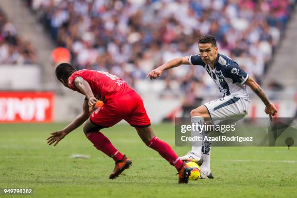 Celso Ortiz of Monterrey fights for the ball with Pedro Aquino of Lobos during the 16th round match between Monterrey and Lobos BUAP as part of the...