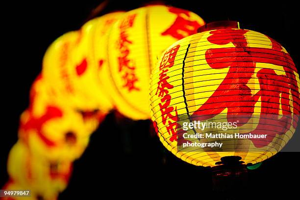 yellow chinese laterns with red characters - taiwan culture stock pictures, royalty-free photos & images